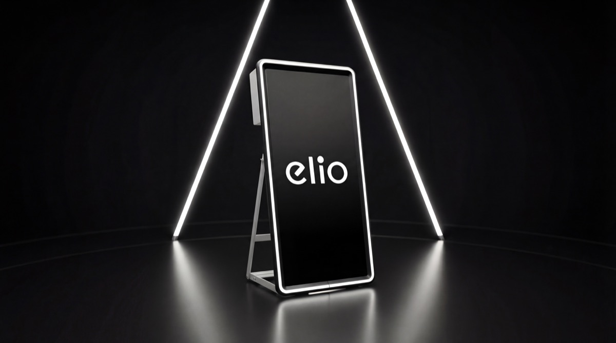 Premium mirror photo booth setup with warm event lighting